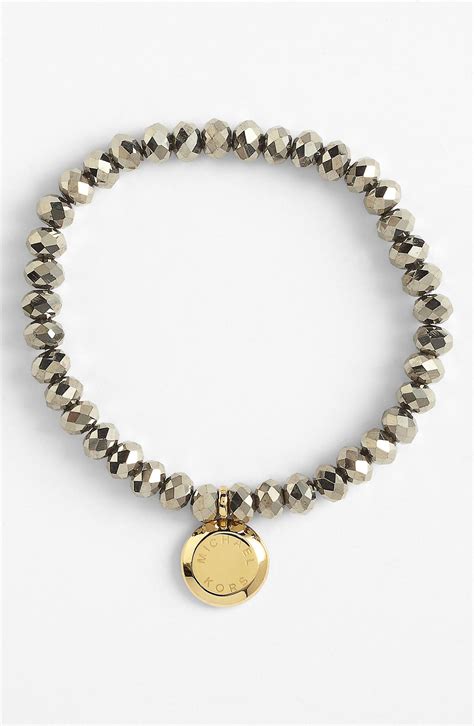 michael kors brilliance gold stretch bead bracelet|Gold.